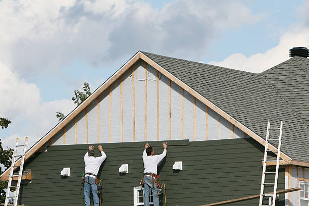 Professional Siding Contractor technician working in Madison, WV